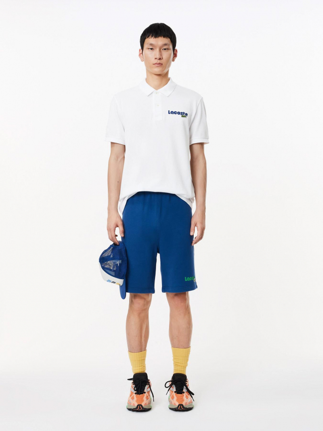 Polo uni logo blanc bleu marine homme - Lacoste