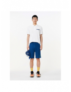 Polo uni logo blanc bleu marine homme - Lacoste