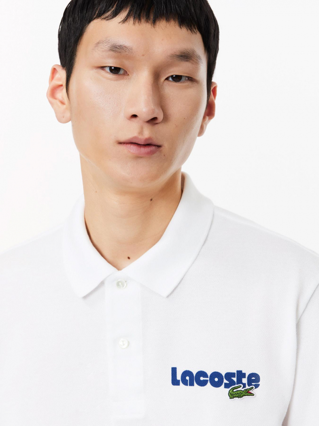 Polo uni logo blanc bleu marine homme - Lacoste