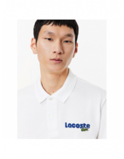 Polo uni logo blanc bleu marine homme - Lacoste