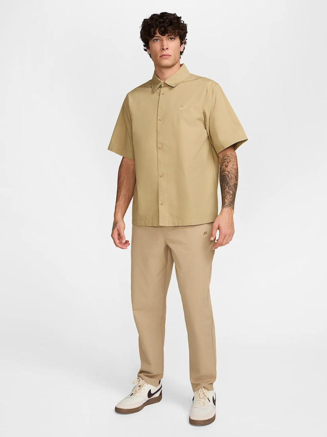 Pantalon tissé fuselé club beige homme - Nike